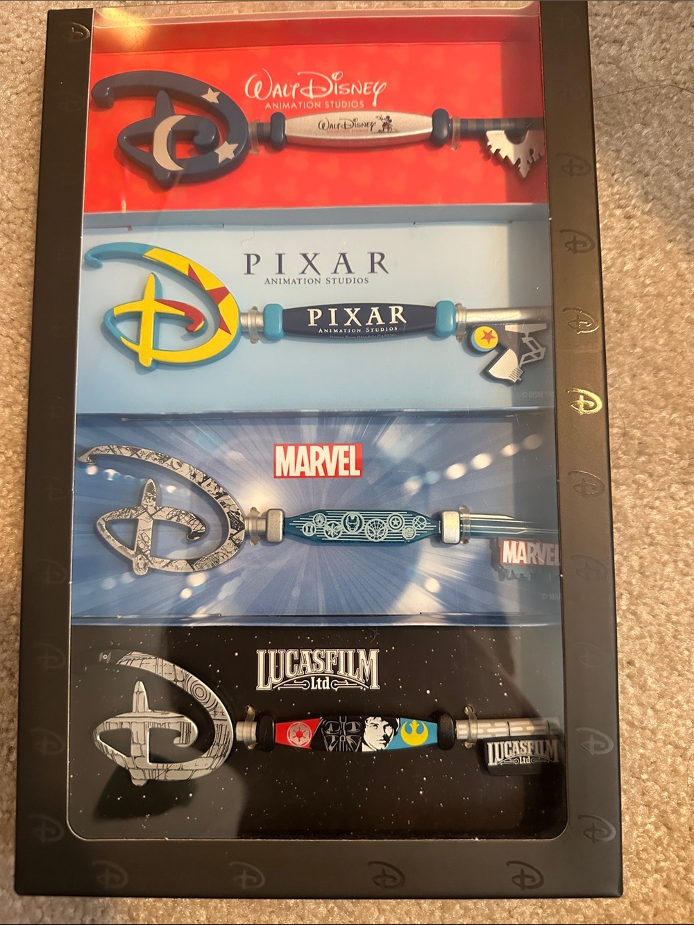 Disney Brand Logo Key Pin Set - Red, Blue, Black, Silver, Yellow